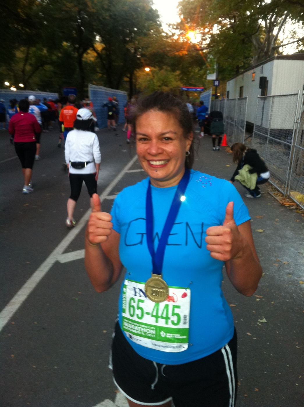 Gwen giving two thumbs up during the New York City Marathon